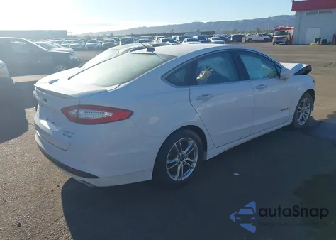 2015 Ford Fusion Hybrid Titanium z USA, uszkodzony, nr VIN 3FA6P0RU2FR199059